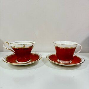 pair of vintage Aynsley Corset Shaped Teacups and Saucers.